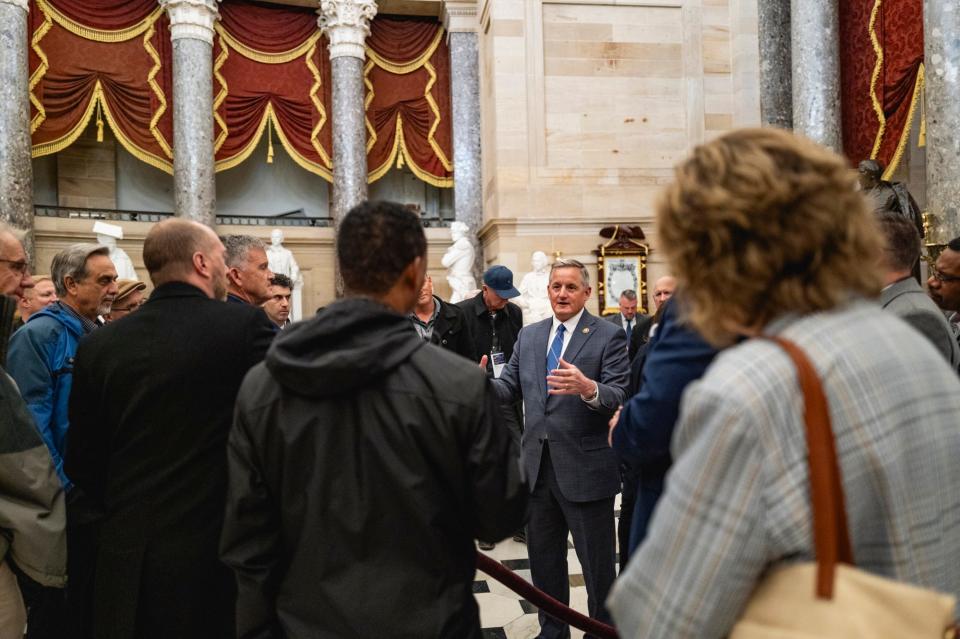 Bruce Westerman speaking to night-time tour group in the Capitol.