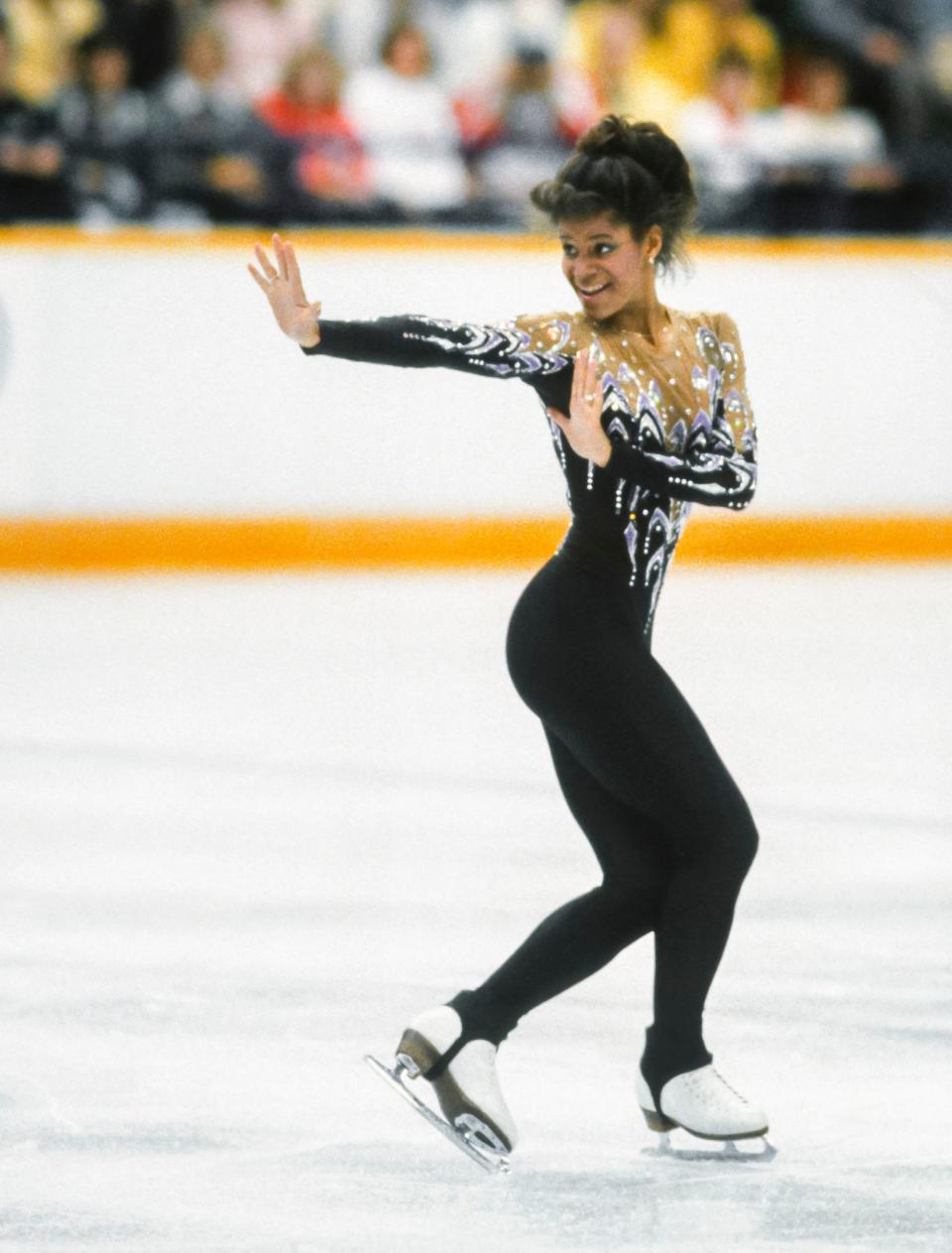 The American athlete skating her short program at the 1988 Winter Olympics on Feb. 25, 1988, in Calgary, Alberta, Canada. Thomas was the bronze medalist in the event.