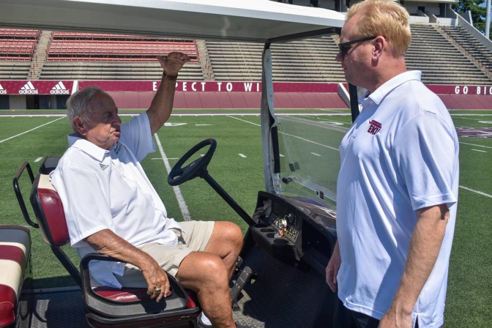 Former Eastern Kentucky football coach Roy Kidd talked with current coach Walt Wells while touring the Colonels’ facility upgrades in 2021.