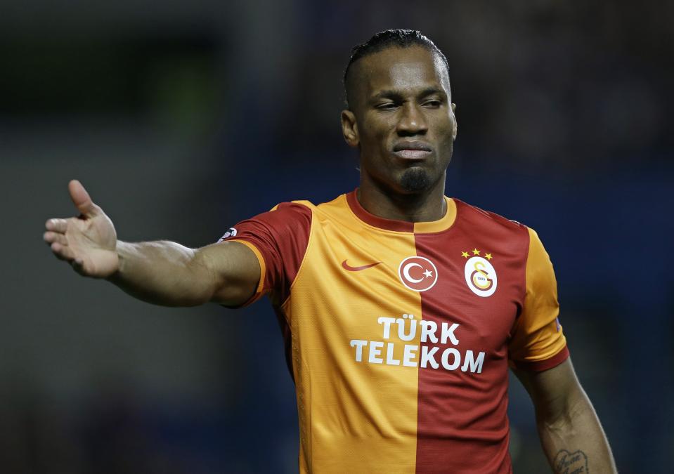 Galatasaray's Didier Drogba gestures during the Champions League round of 16 second leg soccer match between Chelsea and Galatasaray at Stamford Bridge stadium in London Tuesday, March 18, 2014. (AP Photo/Kirsty Wigglesworth)