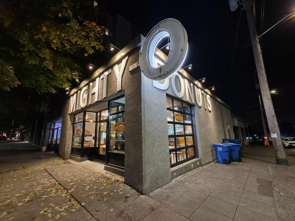 A donut shop at night