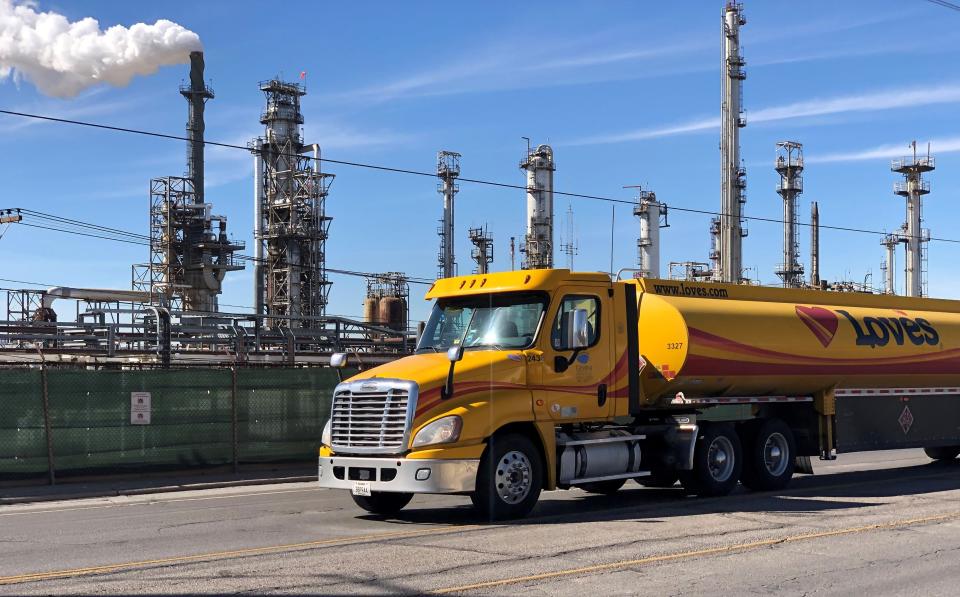 A fuel truck passes by part of the Marathon Petroleum Corp. oil refinery on Trowbridge Drive in East-Central El Paso in January 2021.