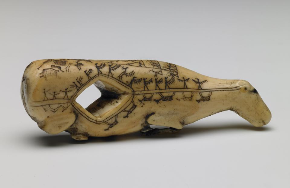 Early 19th century Alaskan arrow straightener carved in the shape of a caribou fawn and engraved with butchering instructions© Trustees of the British Museum