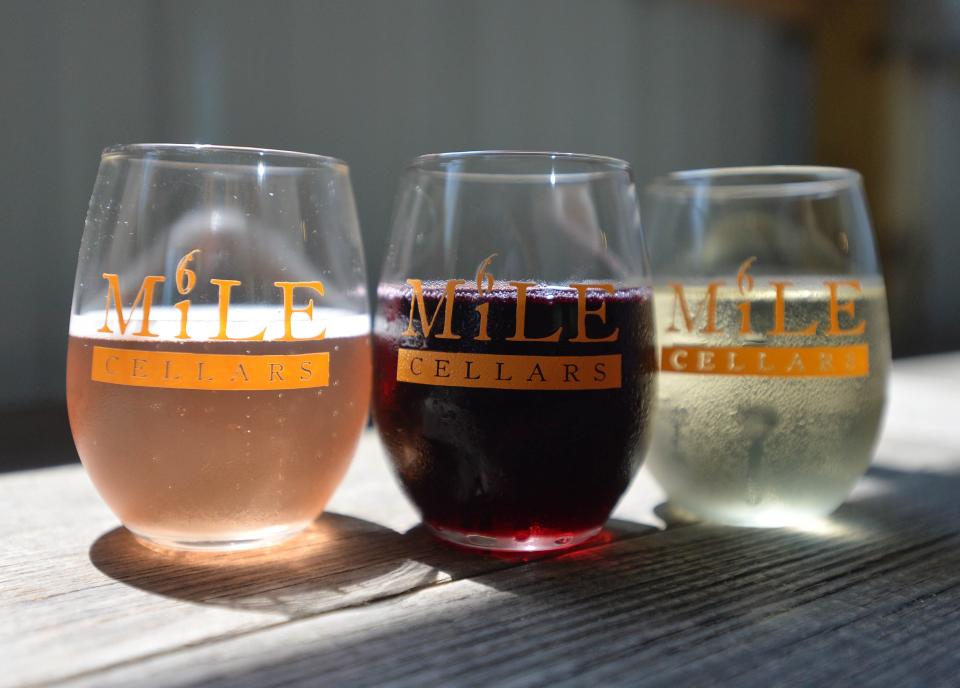 Wines offered at 6 Mile Cellars including, from left, Rose cider, Derby Red and estate-grown Niagara are shown on June 12, 2021, in Harborcreek Township.