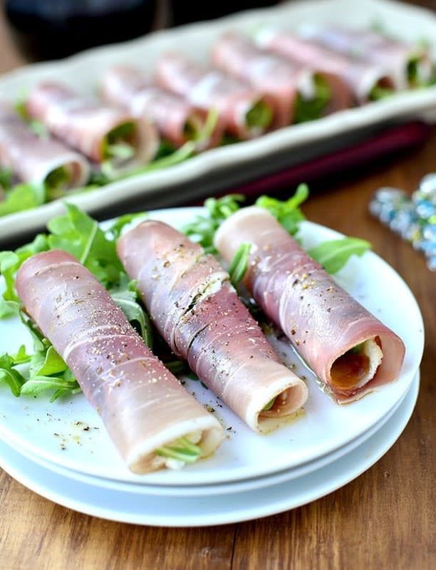 <p>Iowa Girl Eats</p><p>These will be a smash hit at your next party. Easy to assemble, gluten-free and bursting with sophisticated flavor! </p><p><strong>Get the recipe: <a href="https://iowagirleats.com/fig-prosciutto-roll-ups/" rel="nofollow noopener" target="_blank" data-ylk="slk:Fig & Prosciutto Roll-Ups;elm:context_link;itc:0;sec:content-canvas" class="link rapid-noclick-resp">Fig & Prosciutto Roll-Ups</a></strong></p>