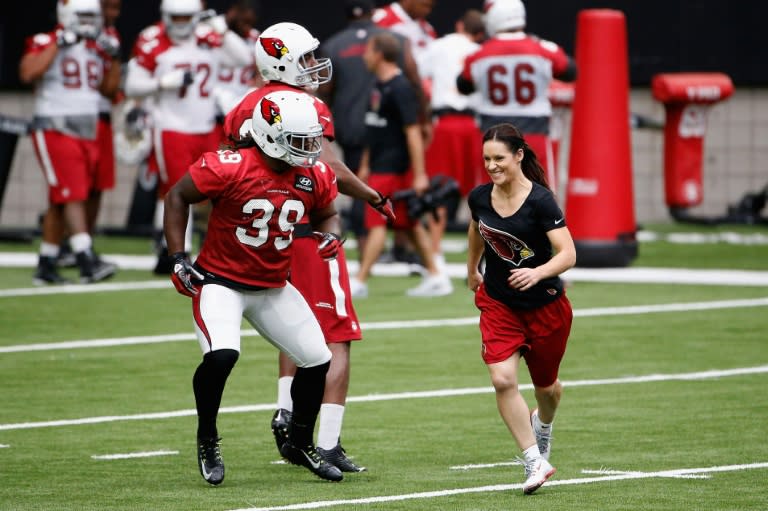 Training camp coach Jen Welter of the Arizona Cardinals participates in on-field drills during a team training camp at University of Phoenix Stadium on August 1, 2015 in Glendale, Arizona