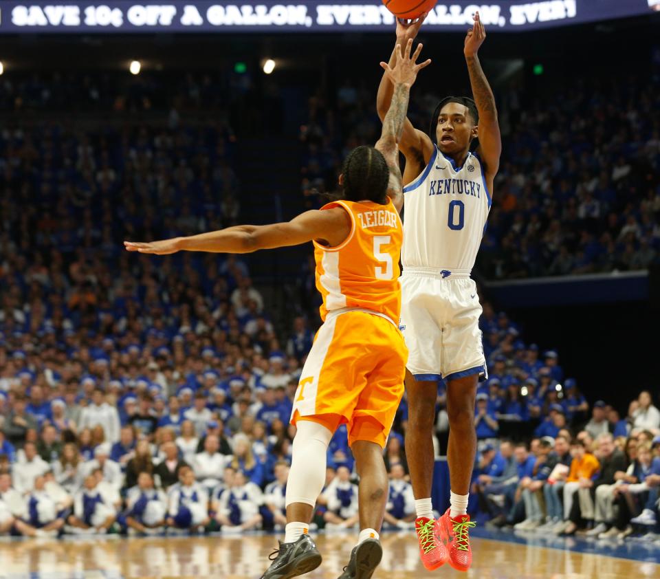 Kentucky’s Rob Dillingham makes a three against Tennessee’s Zakai Zeigler Saturday night at Rupp Arena.
Feb. 3, 2024