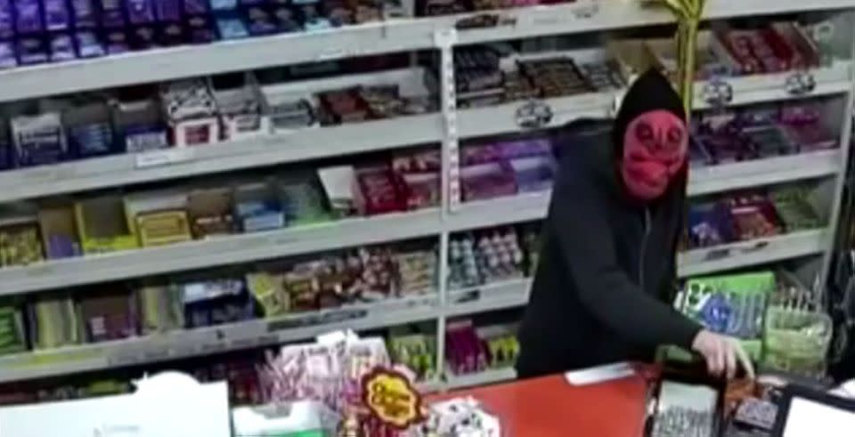 A masked man threatened staff at a Dandenong milk bar. Photo: 7 News