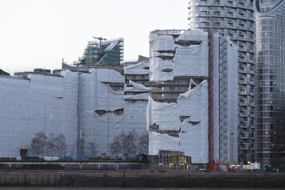 LONDON, ENGLAND - FEBRUARY 18: A view covered buildings as the Storm Eunice brings high winds across the country in London, United Kingdom on February 18, 2022. Some walkways have been closed for safety in case the roofs fly off. Train services were suspended in London and Wales due to the storm. People struggle to walk, trees fell and so many damages occured in the wind. Storm Eunice negatively impacted daily life as authorities urged people to 