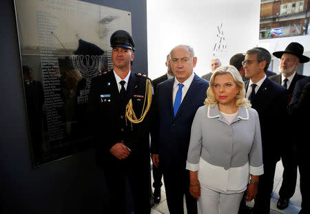 Israeli Prime Minister Benjamin Netanyahu and his wife Sara arrive at the Argentine Israeli Mutual Association (AMIA) Jewish community center, which was bombed in 1994, in Buenos Aires, Argentina September 11, 2017. Embassy of Israel in Buenos Aires/Handout via REUTERS