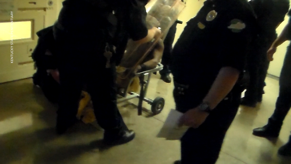 Marcus Penman, a mentally ill prisoner, was put in a restraint chair, choked by an officer, and then covered with a spit hood as he gagged on residual pepper spray. He began making the harsh, grating sounds of a man dying. As he lay motionless and unresisting, a guard continued to press a stun shield against his face and body, the video shows.