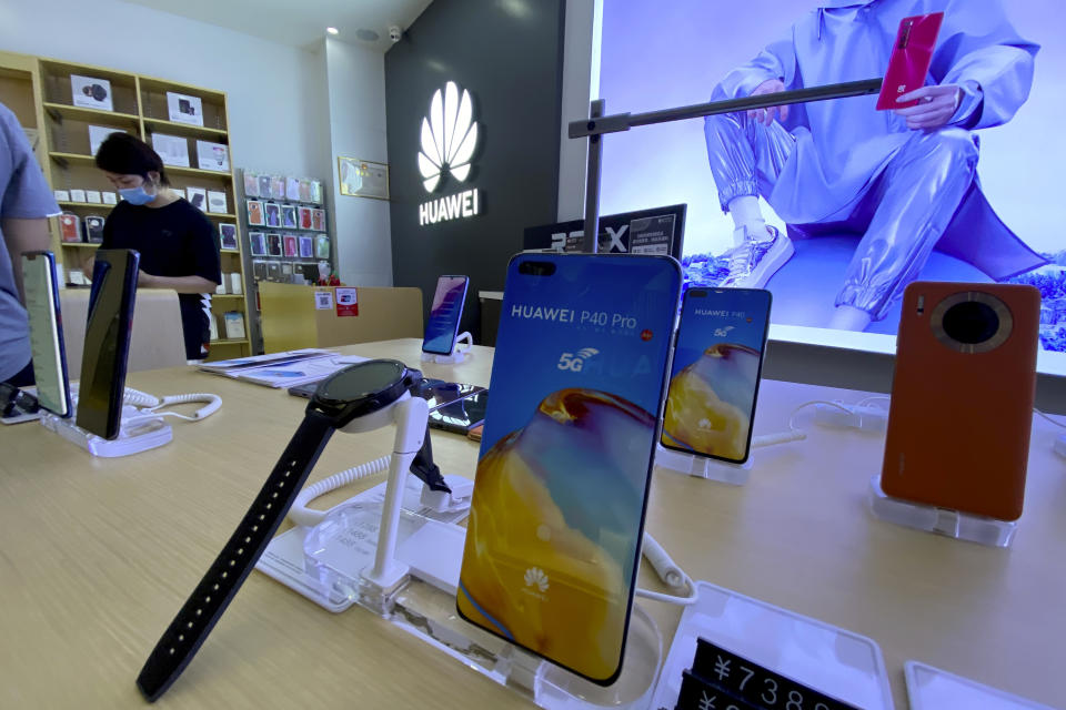 Huawei devices are displayed in a Huawei store in Beijing on Wednesday, June 2, 2021. Huawei is launching its own HarmonyOS mobile operating system on its handsets as it adapts to losing access to Google mobile services two years ago after the U.S. put the Chinese telecommunications company on a trade blacklist. (AP Photo/Ng Han Guan)
