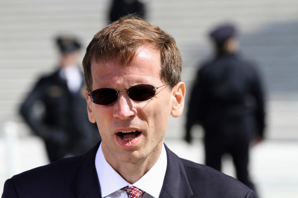 In this March 26, 2012, file photo, Gregory Katsas speaks outside of the Supreme Court in Washington.