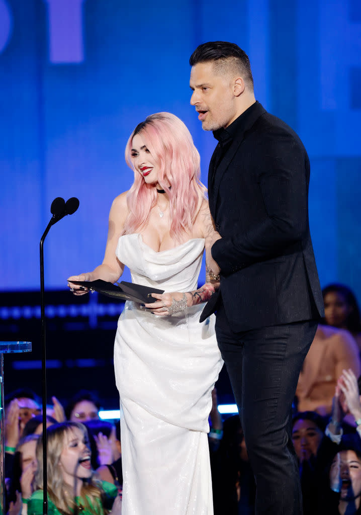 SANTA MONICA, CALIFORNIA - FEBRUARY 18: 2024 PEOPLE'S CHOICE AWARDS -- Pictured: (l-r) Megan Fox and Joe Manganiello speak onstage during the 2024 People's Choice Awards held at Barker Hangar on February 18, 2024 in Santa Monica, California. --  (Photo by Trae Patton/NBC via Getty Images)