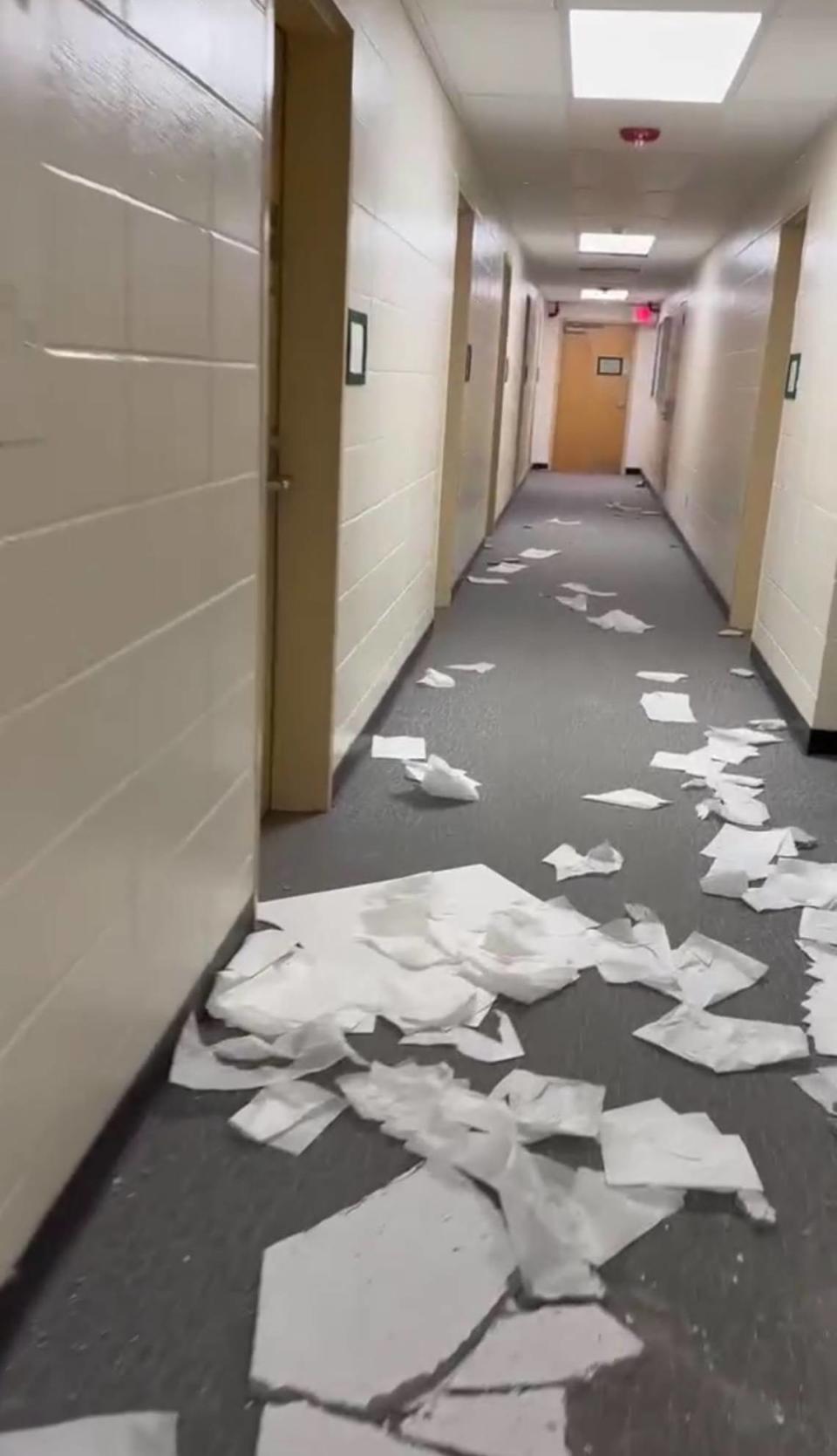 Screenshot of video showing broken ceiling tiles, trash littering a hallway in Tenaya Hall after an early-morning St. Patrick’s Day party left parts of campus damaged on March 16, 2024. Allison Cadena