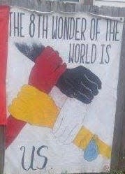 In Minneapolis, Minnesota, a sign that reads, "The 8th Wonder of the World is Us."