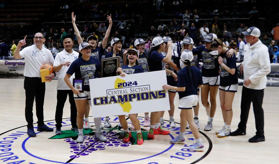 Monache's celebrates their victory against Tehachapi during their Central Section Division II high school girls basketball championship game at Selland Arena on Friday, Feb. 23, 2024 in Fresno, Calif. Monache won 41-37.