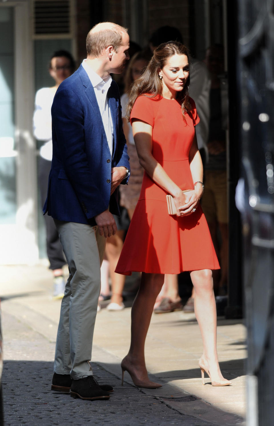 <p>Kate’s latest outing to a young people’s mental health charity saw the Duchess in a scarlet L.K. Bennett dress paired with nude Gianvito Rossi pumps and a matching box clutch.</p><p><i>[Photo: PA]</i></p>