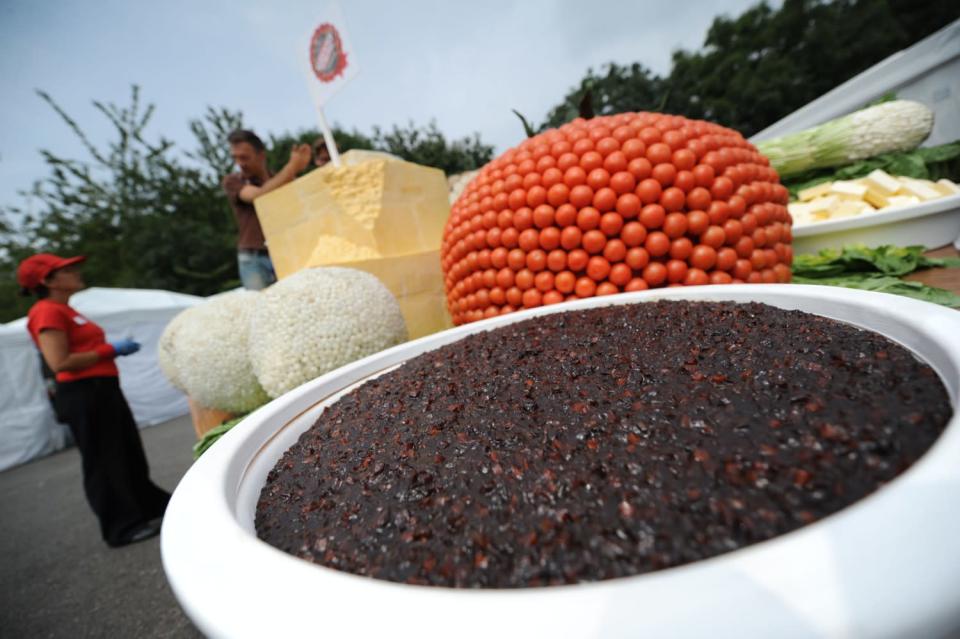 <b>Ploughman's lunch</b><br><br> The prospect of cheese, pickle and tomato is enough to get most people salivating, but few would be able to polish off this enormous ploughman's lunch. It was created at Battersea Park in the UK in 2011 and would surely leave any would-be consumer in a pickle. <br><br>(Image: Getty)