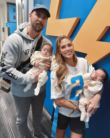 <p>Barbie Blank/Instagram</p> Barbie Blank and her husband pose with their twins