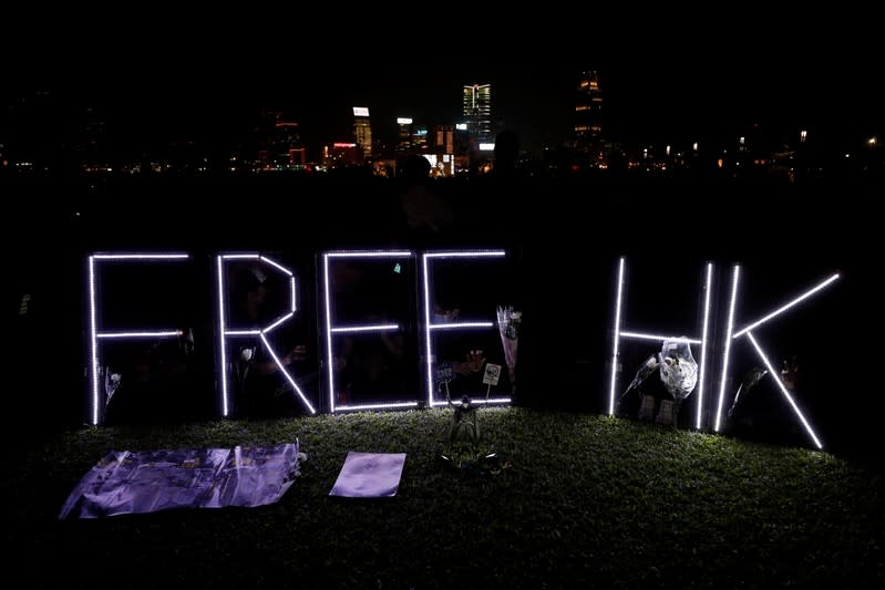 Letters reading ''Free HK'' are seen in Tamar Park during a prayer and remembrance ceremony in Hong Kong