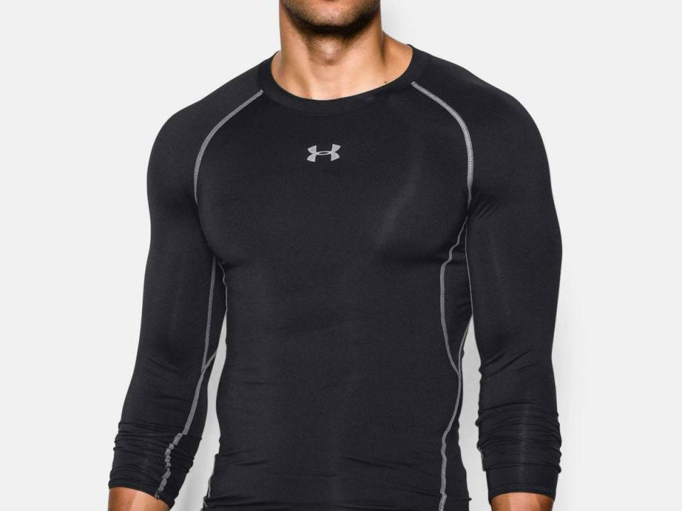 A model wearing the Under Armour HeatGear shirt.