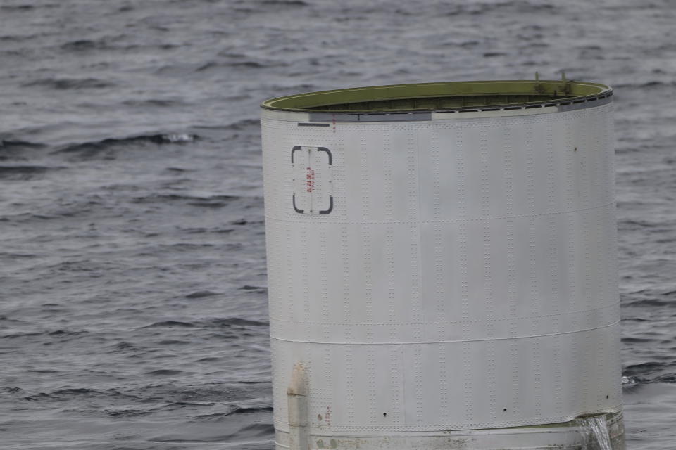 This photo provided by South Korea's Defense Ministry, shows an object salvaged by South Korea's military that is presumed to be part of the North Korean space-launch vehicle that crashed into sea following a launch failure in waters off Eocheongdo island, South Korea Wednesday, May 31, 2023. (South Korea Defense Ministry via AP)