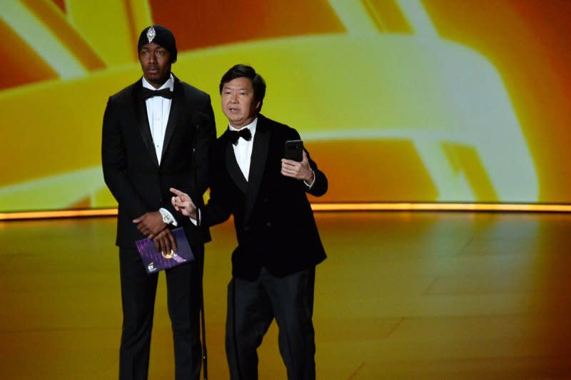 "Masked Singer" stars Nick Cannon (L) and Ken Jeong are seen onstage during the Primetime Emmy Awards at the Microsoft Theater in Los Angeles in 2019. File Photo by Jim Ruymen/UPI