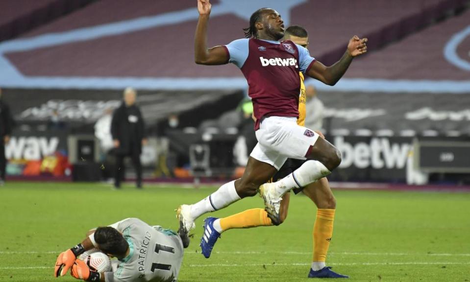 West Ham’s Michail Antonio leaps above Wolverhampton Wanderers’ goalkeeper Rui Patricio.