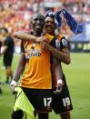 Britain Soccer Football - Hull City v Sheffield Wednesday - Sky Bet Football League Championship Play-Off Final - Wembley Stadium - 28/5/16 Hull City's Mohamed Diame (L) and Chuba Akpom celebrate after winning promotion back to the Premier League Action Images via Reuters / Andrew Couldridge Livepic EDITORIAL USE ONLY. No use with unauthorized audio, video, data, fixture lists, club/league logos or "live" services. Online in-match use limited to 45 images, no video emulation. No use in betting, games or single club/league/player publications. Please contact your account representative for further details.