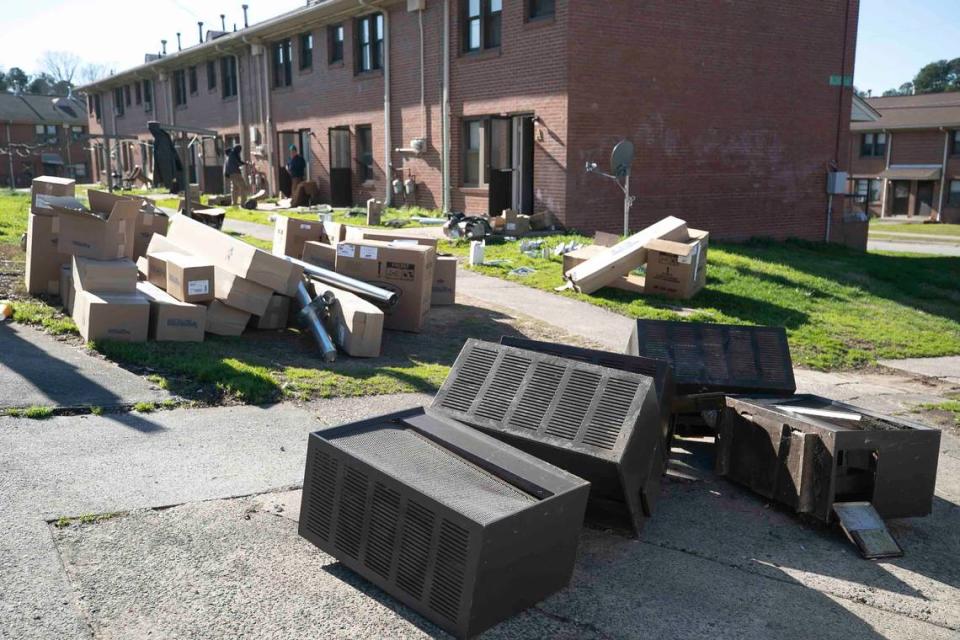 Discarded heating units are placed at the curb on Friday, February 14, 2020 at McDougald Terrace in Durham, N.C. as renovations at the Durham Housing complex continue. Eight families were notified on Friday that they could move back into their renovated units.