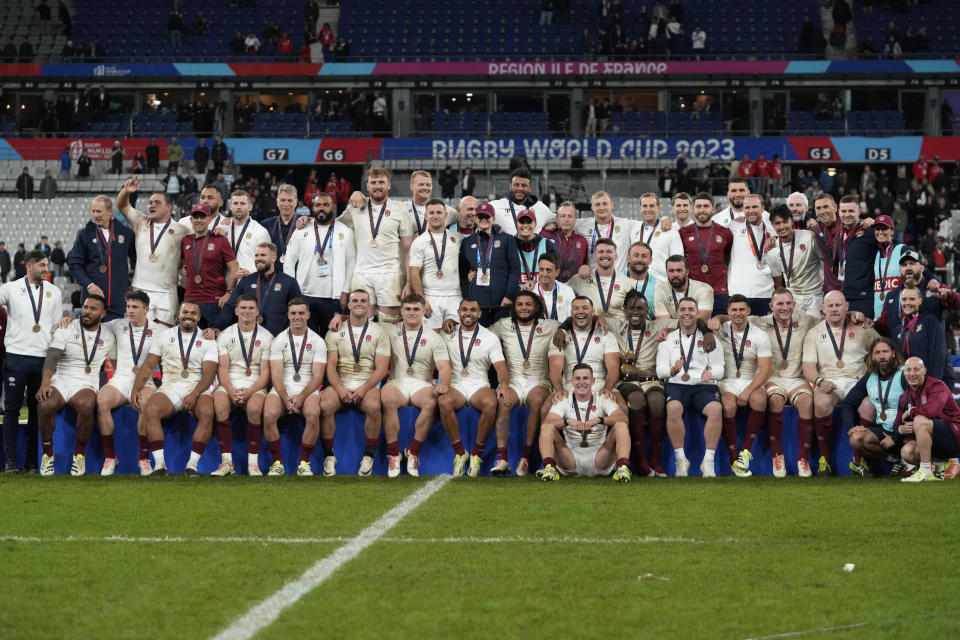 England players pose after winning the Rugby World Cup third place match between England and Argentina at the Stade de France in Saint-Denis, outside Paris, Friday, Oct. 27, 2023. (AP Photo/Themba Hadebe)