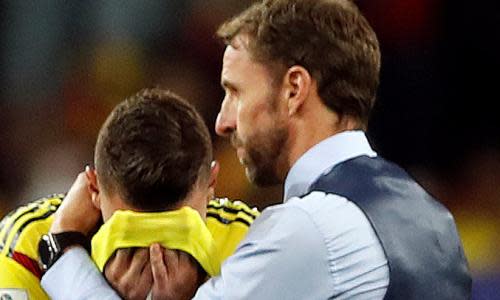 Gareth Southgate, who missed a penalty at Euro 96, consoles Mateus Uribe after the Colombian missed in the shootout against England last week.