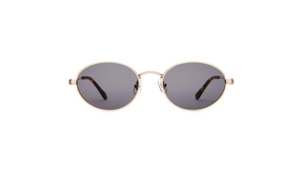 <p>The New Riddim $75, <a rel="nofollow noopener" href="https://www.crapeyewear.com/products/the-new-riddim-gold-metal-grey-oval-sunglasses" target="_blank" data-ylk="slk:crapeyewear.com;elm:context_link;itc:0;sec:content-canvas" class="link ">crapeyewear.com</a> </p>