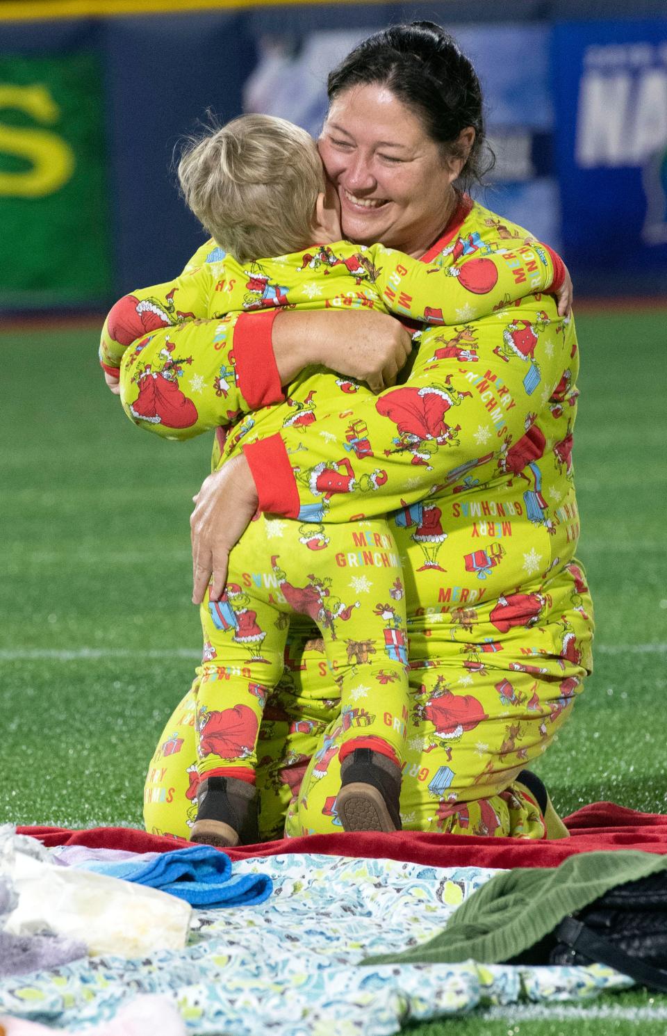 Escambia County Public Schools employees and their families were invited to a special showing of the holiday film The Grinch at Blue Wahoos Stadium on Friday, Dec. 2, 2022.  Hot chocolate, cookies, popcorn, and other holiday-themed treats were provided to the moviegoers during the event. 