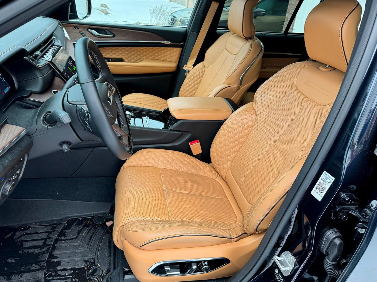 The tan interior of a Jeep