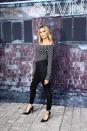 <p>The model channelled Grease's Sandy in high-waisted black jeans, sky-high stilettos and a form-fitting bodysuit for the Calvin Klein event.</p><p>Thankfully, her logo-emblazoned bodysuit is available to shop now for only £55.</p><p><a class="link " href="https://www.calvinklein.co.uk/ck50-all-over-logo-bodysuit-j20j2138040gn" rel="nofollow noopener" target="_blank" data-ylk="slk:SHOP NOW">SHOP NOW</a></p>