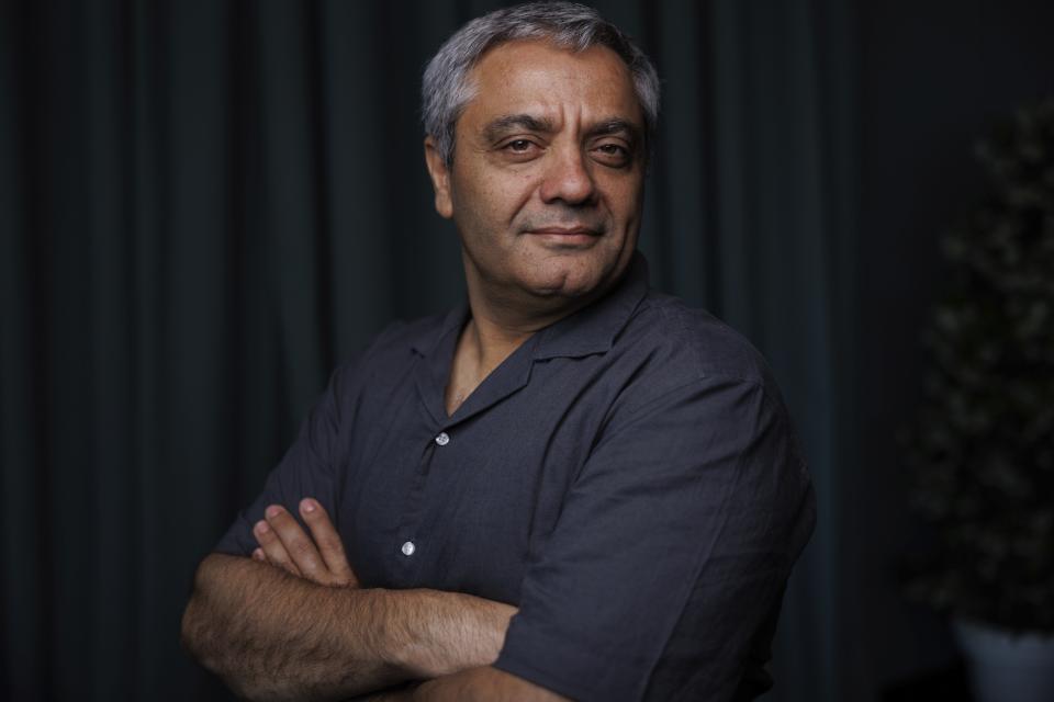 Director Mohammad Rasoulof poses for a portrait photograph for the film 'The Seed of the Sacred Fig' at the 77th international film festival, Cannes, southern France, Thursday, May 23 2024. (Photo by Vianney Le Caer/Invision/AP)