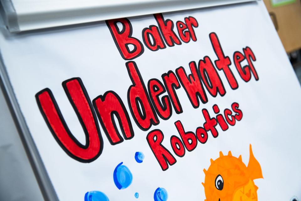 A sign for the Baker Middle School robotics team at a meeting on Friday, June 24, 2022. The team's robots will face off against others at a competition later in the year.