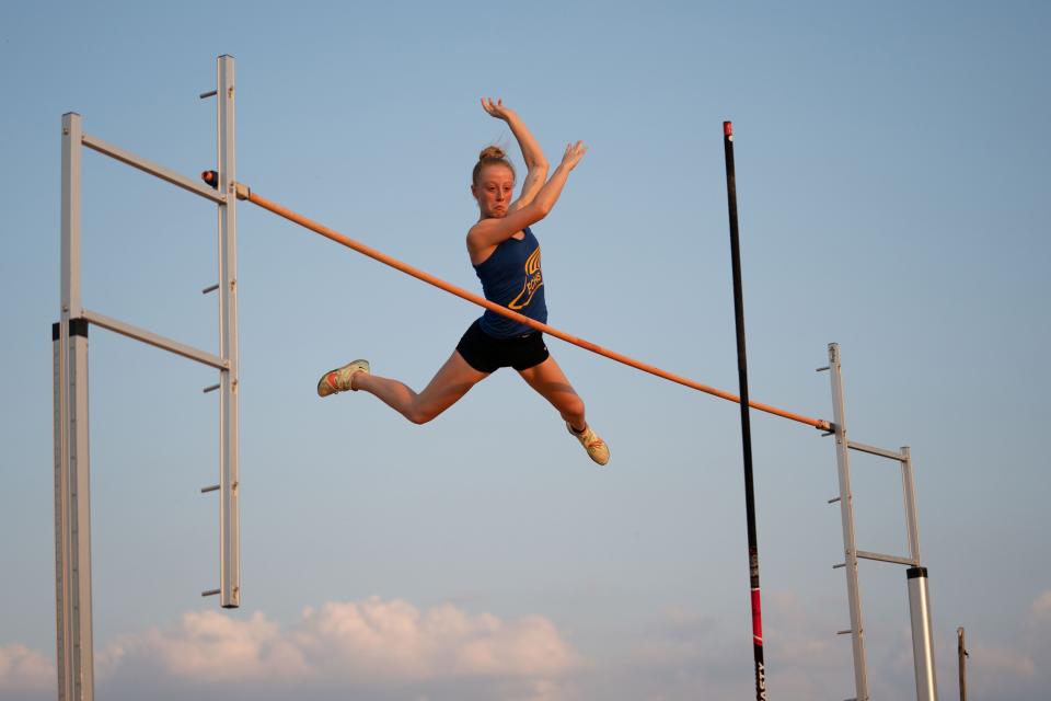 Evansville Christian's Ann Elise Sloan clears 10' in the pole vault event during the IHSAA Girls Regional 8 Track & Field Meet at Central Stadium Tuesday evening, May 23, 2023. Sloan won the event with an eventual jump of 11'.