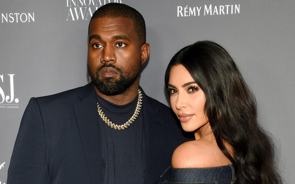 Kanye West and Kim Kardashian - Evan Agostini/Invision/AP