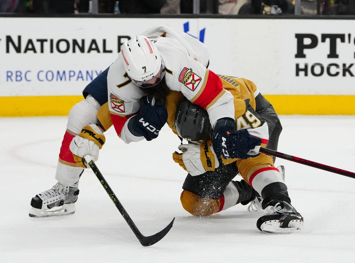 Jun 3, 2023; Las Vegas, Nevada, USA; Florida Panthers defenseman Radko Gudas (7) grapples with Vegas Golden Knights center Ivan Barbashev (49) in the second period in game one of the 2023 Stanley Cup Final at T-Mobile Arena. Mandatory Credit: Stephen R. Sylvanie-USA TODAY Sports Stephen R. Sylvanie/Stephen R. Sylvanie-USA TODAY Sports