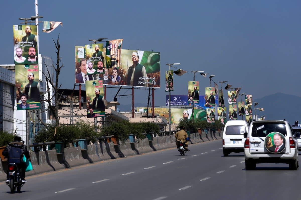 Welcoming banners for Nawaz Sharif on a highway in Rawalpindi (AP)