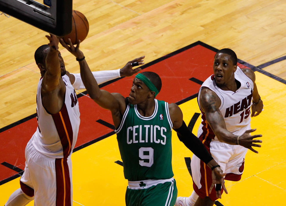 MIAMI, FL - JUNE 09: Rajon Rondo #9 of the Boston Celtics goes up for a shot between Dwyane Wade #3 and Mario Chalmers #15 of the Miami Heat in the first half in Game Seven of the Eastern Conference Finals in the 2012 NBA Playoffs on June 9, 2012 at American Airlines Arena in Miami, Florida. (Photo by J. Meric/Getty Images)