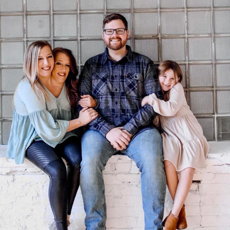 Abby and Brittany Hensel with Josh Bowling and his 8-year-old daughter, Isabella. Joshua Bowling / Facebook