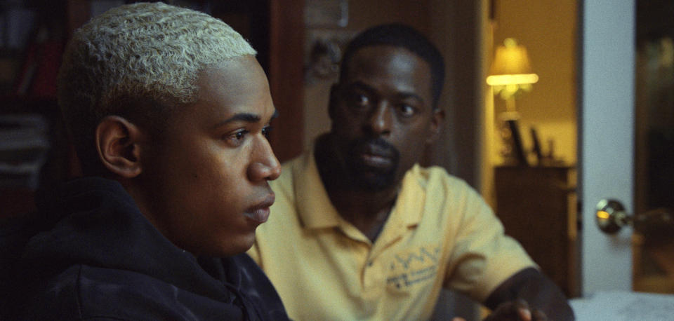 This image released by A24 shows Kelvin Harrison Jr., left, and Sterling K. Brown in a scene from "Waves." (A24 via AP)