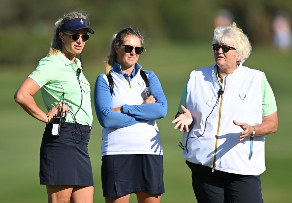 Suzann Pettersen, captain of team Europe talks with her assistant Dame Laura Davies  during practice (Getty Images)