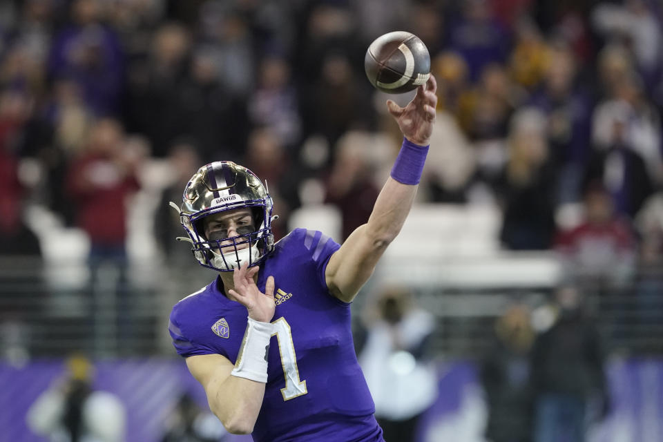 Washington quarterback Sam Huard passes against Washington State during the first half of an NCAA college football game, Friday, Nov. 26, 2021, in Seattle. (AP Photo/Ted S. Warren)