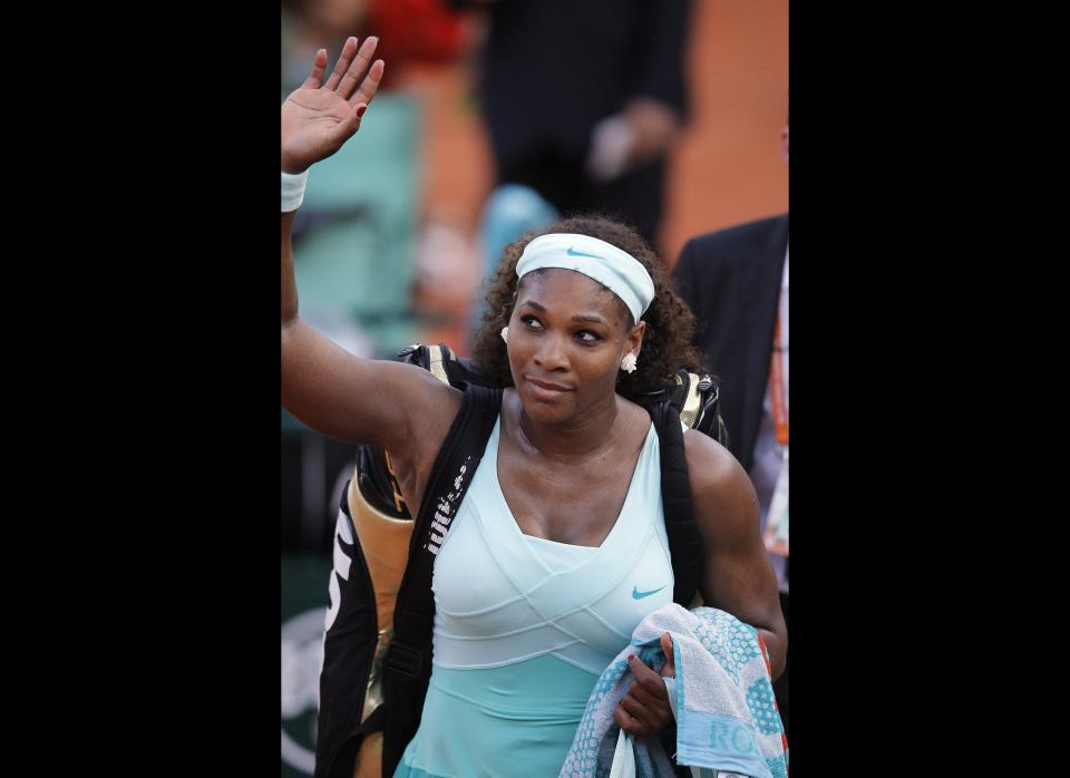 US Serena Williams leaves after leaving France's Virginie Razzano during their Women's Singles 1st Round tennis match of the French Open tennis tournament at the Roland Garros stadium in Paris.     (PATRICK KOVARIK/AFP/GettyImages)