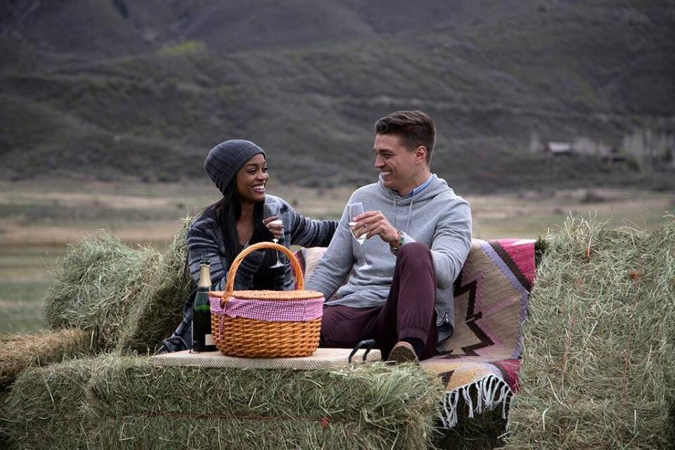a photo of rachel and dean on a picnic date